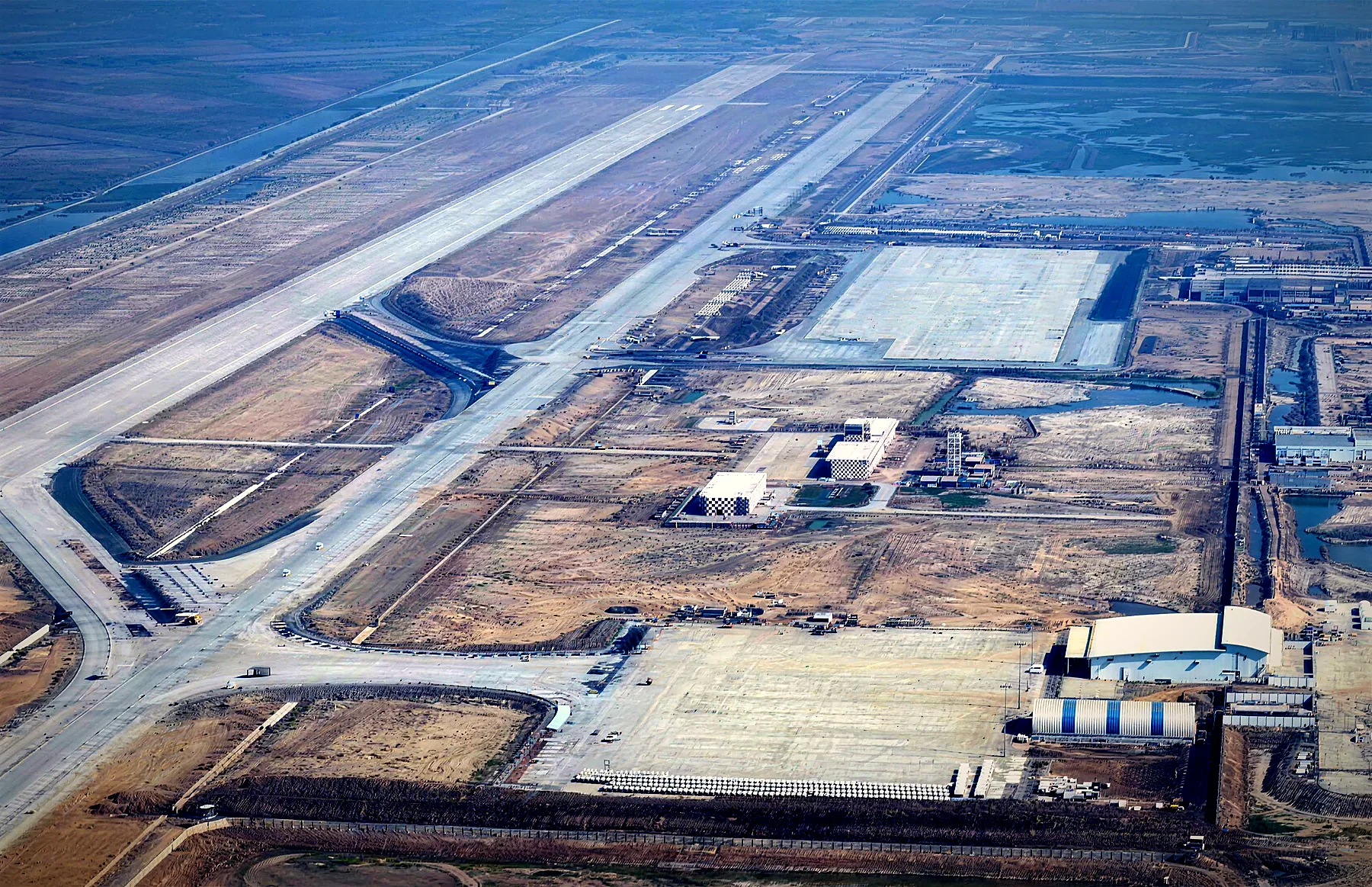 Aerial photo of the Dholera airport apron, hangar and terminal area under construction